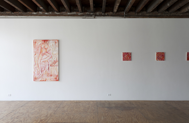 installation image of red paintings